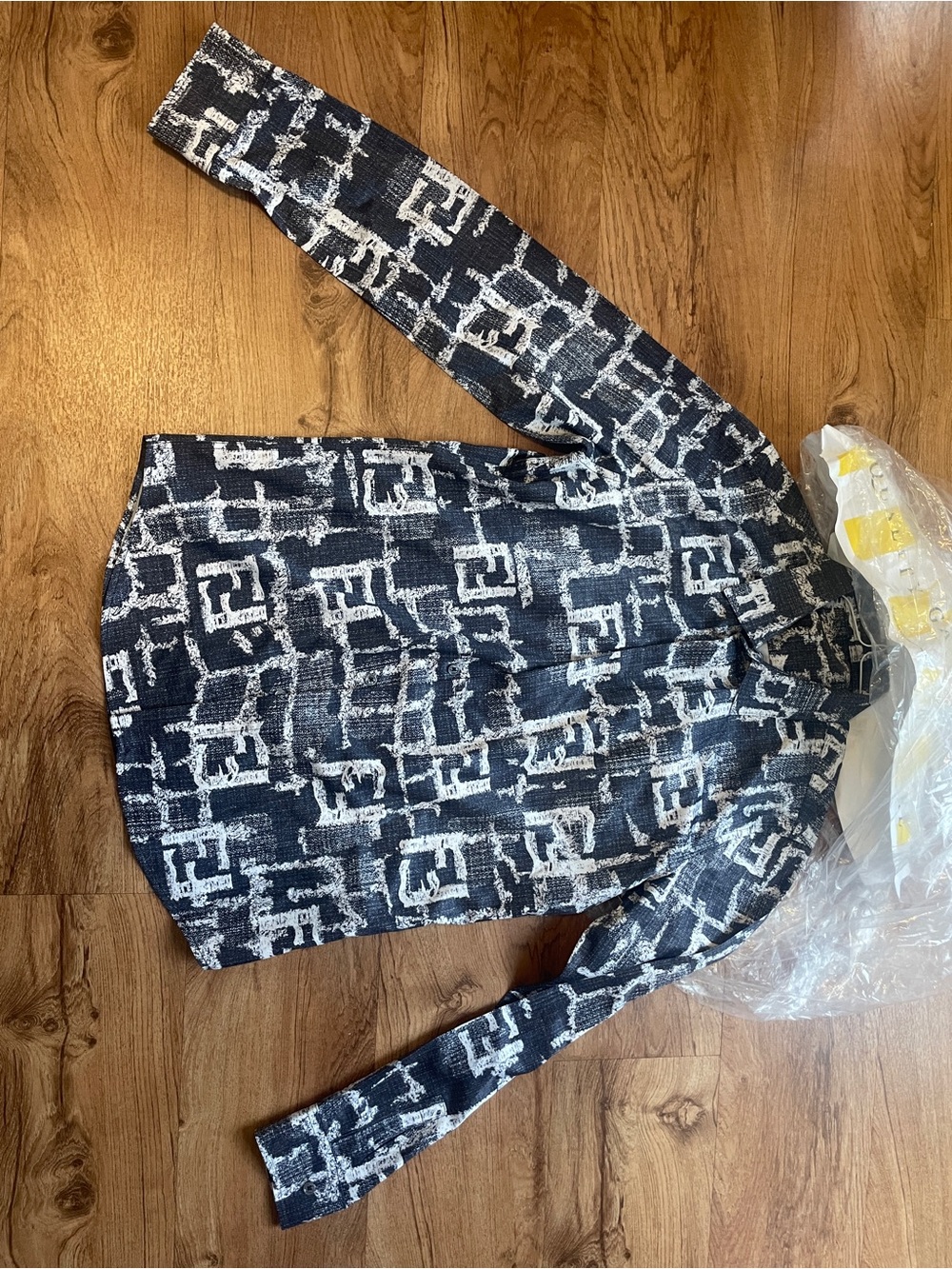 Fendi men's denim jacket featuring an all-over FF logo motif in blue and white.